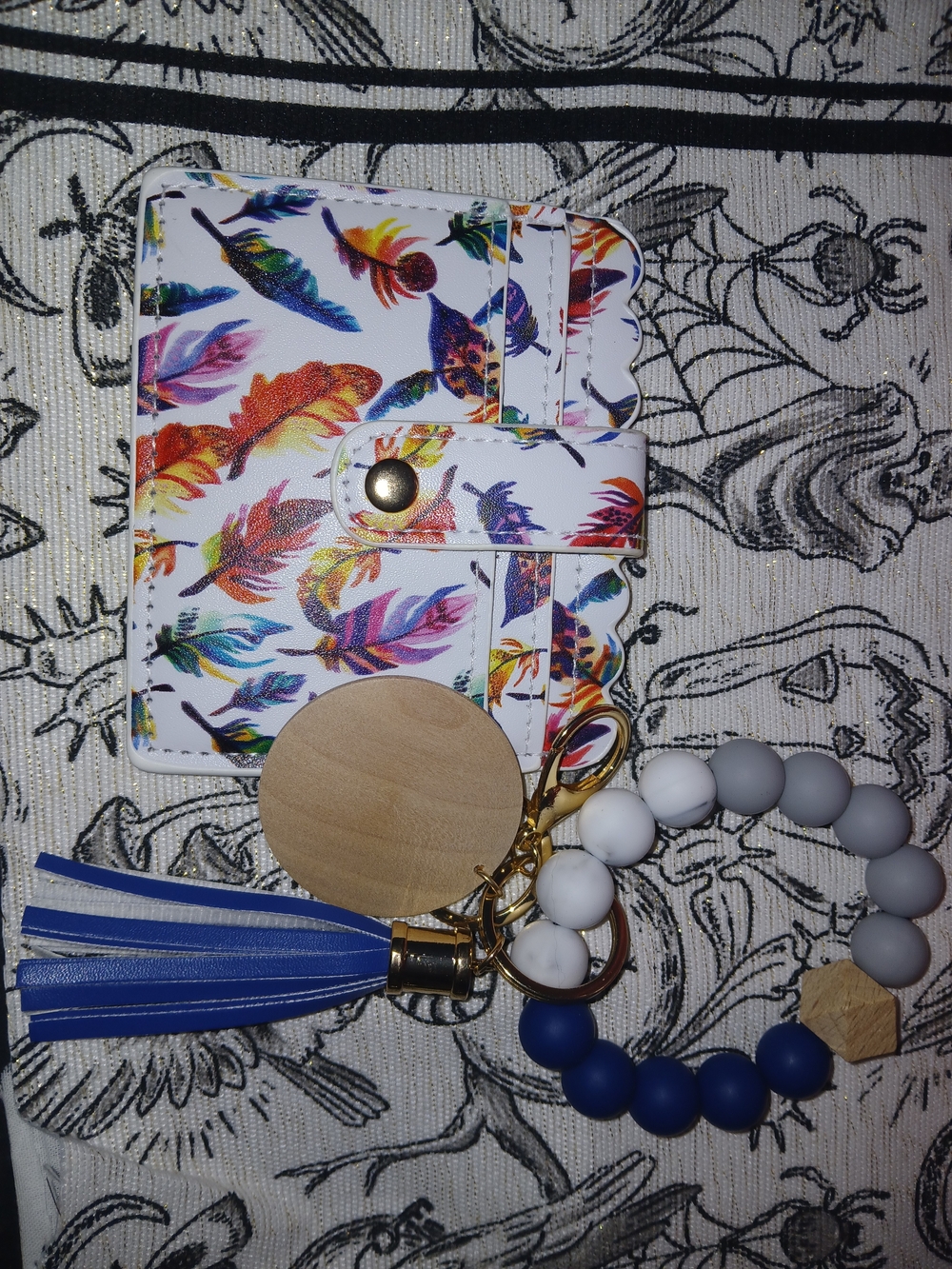 Women's White Feather Print Clutch with Multicolor Accents